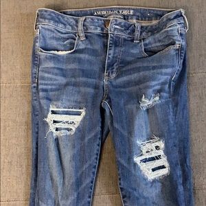 AE size 12 super super stretch x distressed jeans